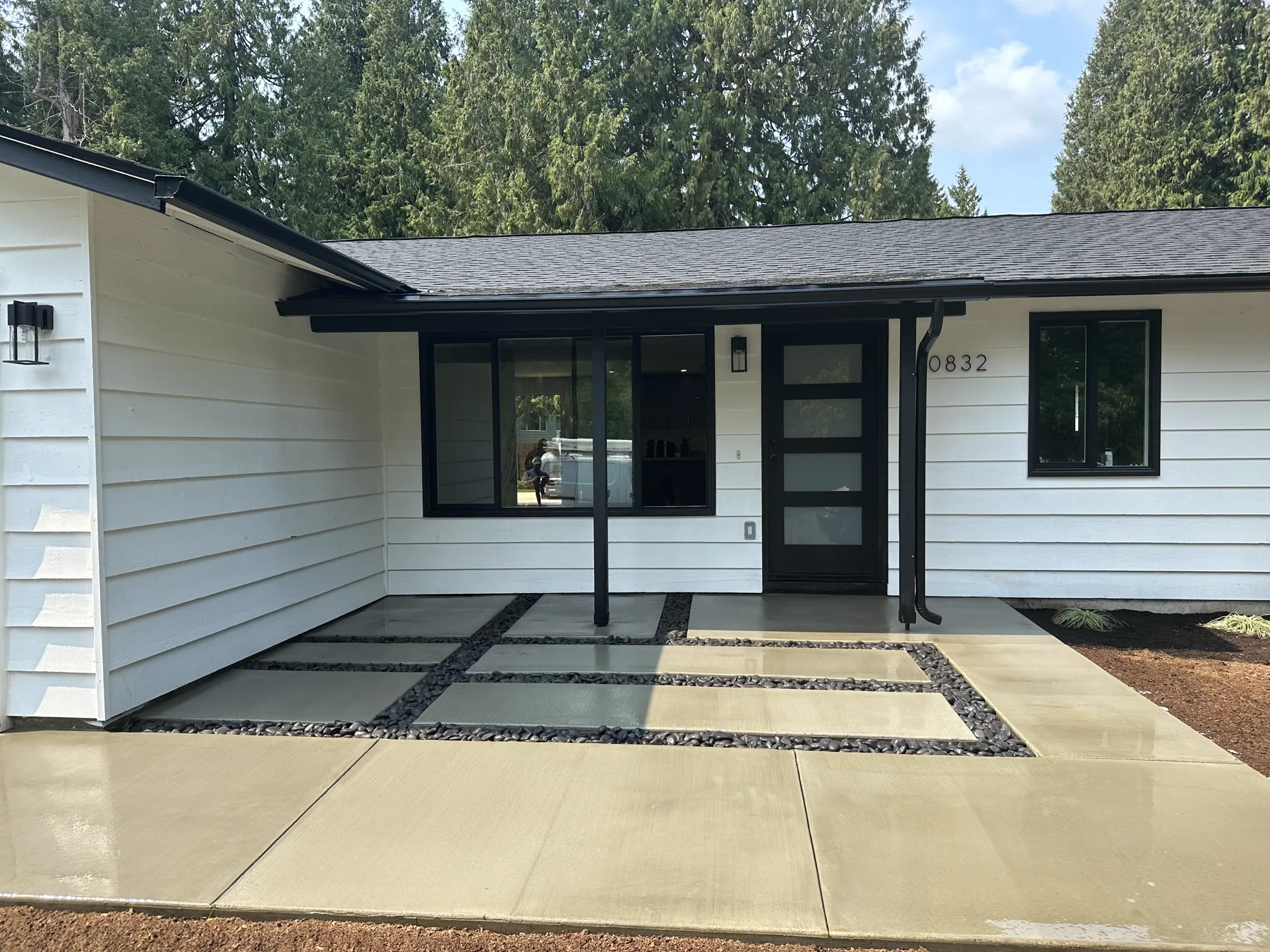 Modern concrete entry pads with gravel joints