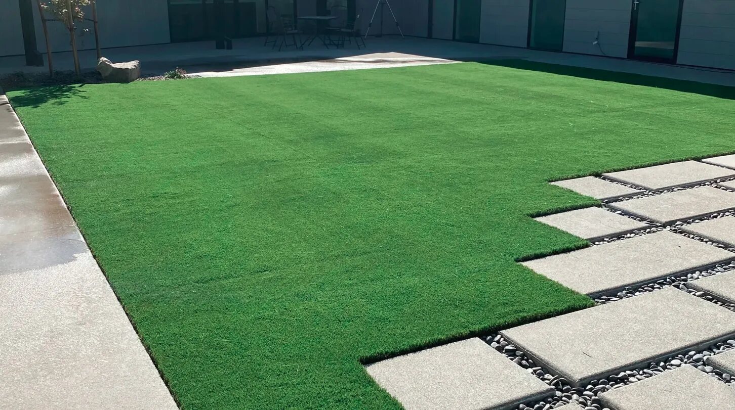 Artificial turf with paver squares