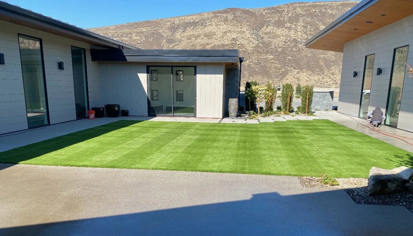 Artificial turf lawn at a modern home
